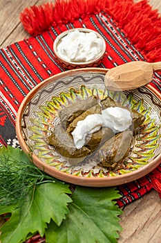 Wine leaf wrapped minced meat, balkanic sarma dish photo