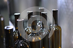 Wine production. Many bottles of wine Craft Winery. Natural cork. A small craft winery. The concept of small wine