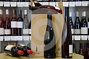 The wine is put in a box and ready for home delivery