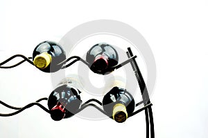 Wine on rack presented on plain white background.