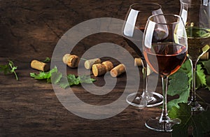 Wine set. Red, white and rose wine in assortment in wineglasses. Wine tasting, vintage wooden background, selective focus, copy