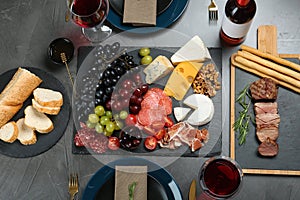 Wine and snacks served for dinner on table in restaurant