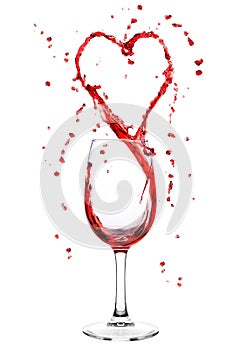 Wine splashing from wineglass in heart shape