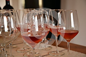 Wine tasting glass and rose wine, Sardinia, Italy.