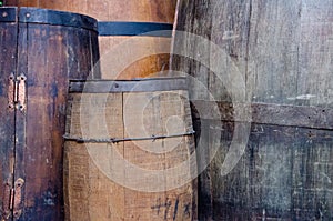 Wine tasting in winery - Wooden barrels and bottles of aged excelent wine