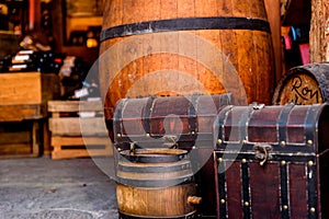 Wine tasting in winery - Wooden barrels and bottles of aged excelent wine