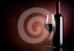 Wine on vinous background photo