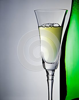 Wineglass and bottle