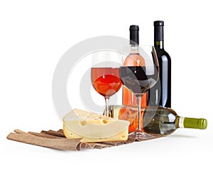 Wineglass, bottle of wine, cheese