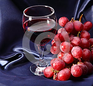 Wineglass and grape