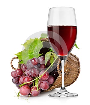 Wineglass and grapes in a basket