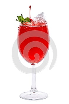 Wineglass with red fruit coctail with mint leaf