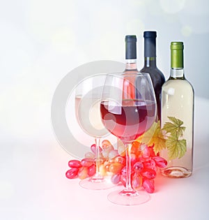 Wineglass, wine and grapes