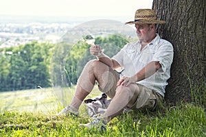 Winemaker drinks white wine
