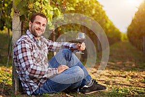 Winemaker with a glass of red wine