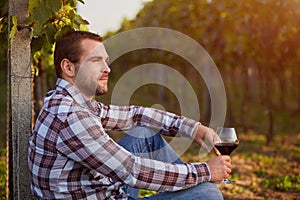 Winemaker with a glass of red wine