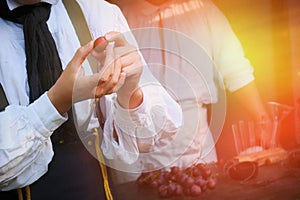 Winemaker shows how to create wine from grapes. Viniculture in France. A man holds a large grape in his hands