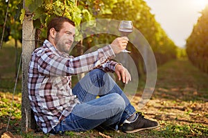 Winemaker tasting red wine