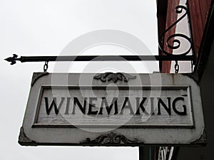 Winemaking hanging vintage sign