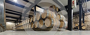 Winery with many wooden barrels