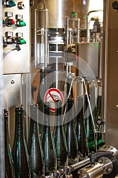 In a winery wine gets bottled automatically