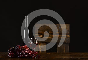 Winetasting and degustation still life concept. Set of dark grapes,