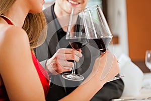 Winetasting in restaurant photo