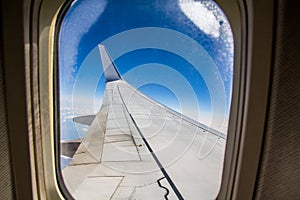 Wing of airplane and window