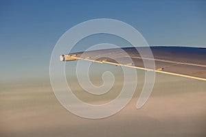 A wing in the clouds