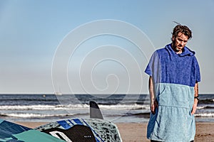 wing foil old kiter on the beach