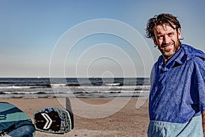 wing foil old kiter on the beach