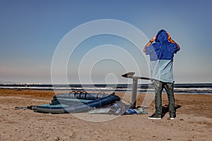 wing foil old kiter on the beach