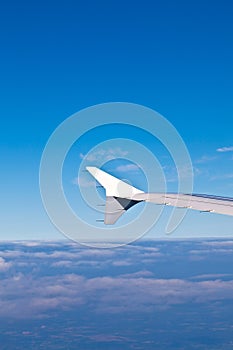 Wing of the plane on a background