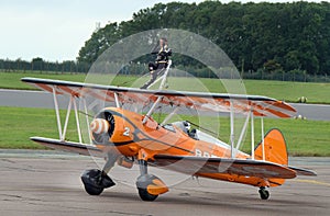 Wing walking display with Boeing Stearman biplanes.