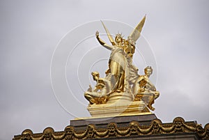 Winged golden statues