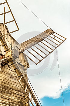 Wings closeup of wooden flour windmill