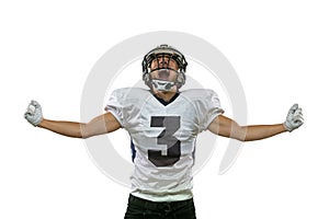 Winner, champion. Portrait of American football player training isolated on white studio background with green grass