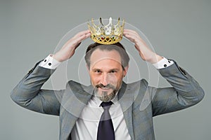 Winner handsome man actor artist scientist with crown, respectful person concept