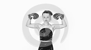 she is a winner. knockout. fit your body. punching. teen girl training in boxing gloves.