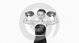 she is a winner. knockout. fit your body. punching. teen girl training in boxing gloves.