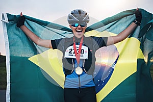 Winner sports, happy woman from brazil with flag and gold medal winning athlete, outdoor cycling race or triathlon
