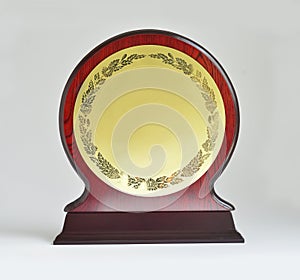 Winner trophy with empty plaque on white background
