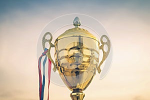 Winner trophy on sky background