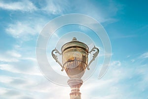 Winner trophy on sky background