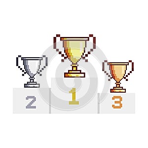 Winners podium with trophy, gold silver and bronze trophy cup 8 bit