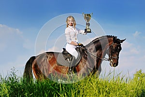 Winners - young girl and bay horse