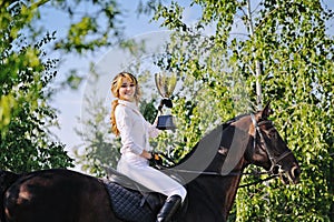 Winners - young girl and bay horse