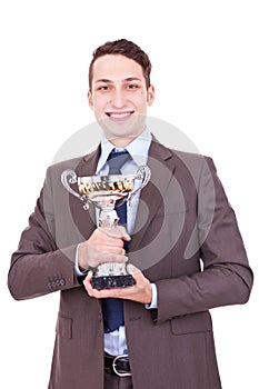 Winning businessman holding his award