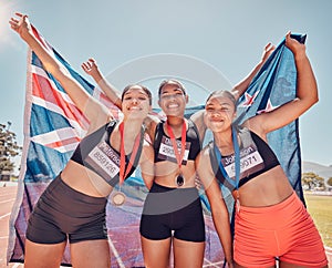 Winning, flag and athlete people or women team with medal for achievement, success and competition portrait on stadium