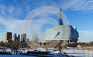 Winnipeg downtown cityscape. Winter view on Canadian Museum for Human Rights seen from The Forks park. Winnipeg